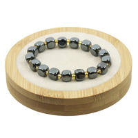 Bransoletka hematyt ze złotym akcentem