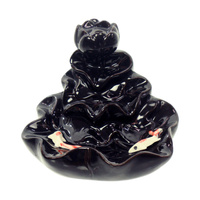 Kominek wodospad z rybami koi